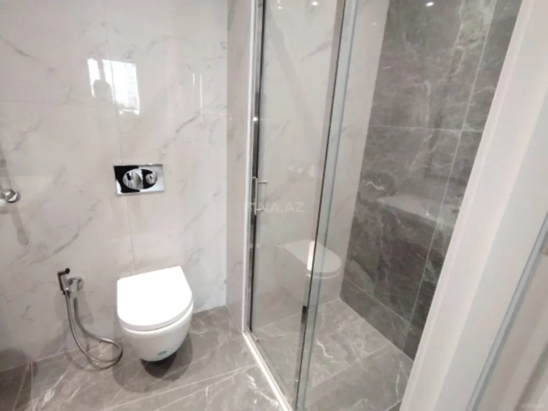 Satılır 4 otaqlı mənzil 121 m²