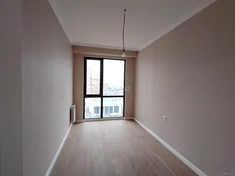 Satılır 4 otaqlı mənzil 121 m²