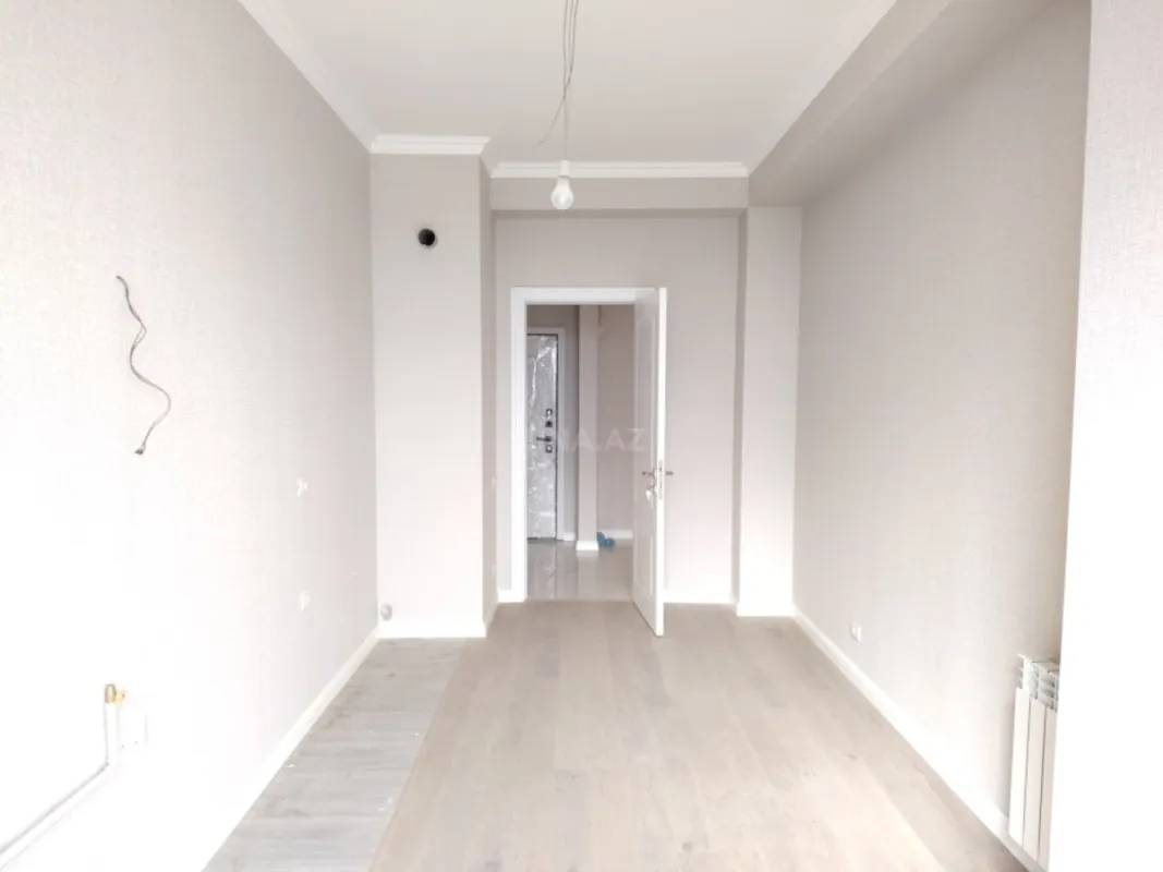 Satılır 4 otaqlı mənzil 121 m²