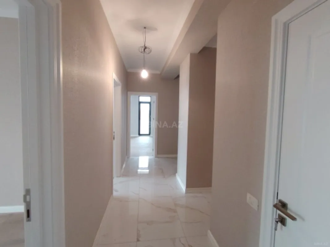 Satılır 4 otaqlı mənzil 121 m²