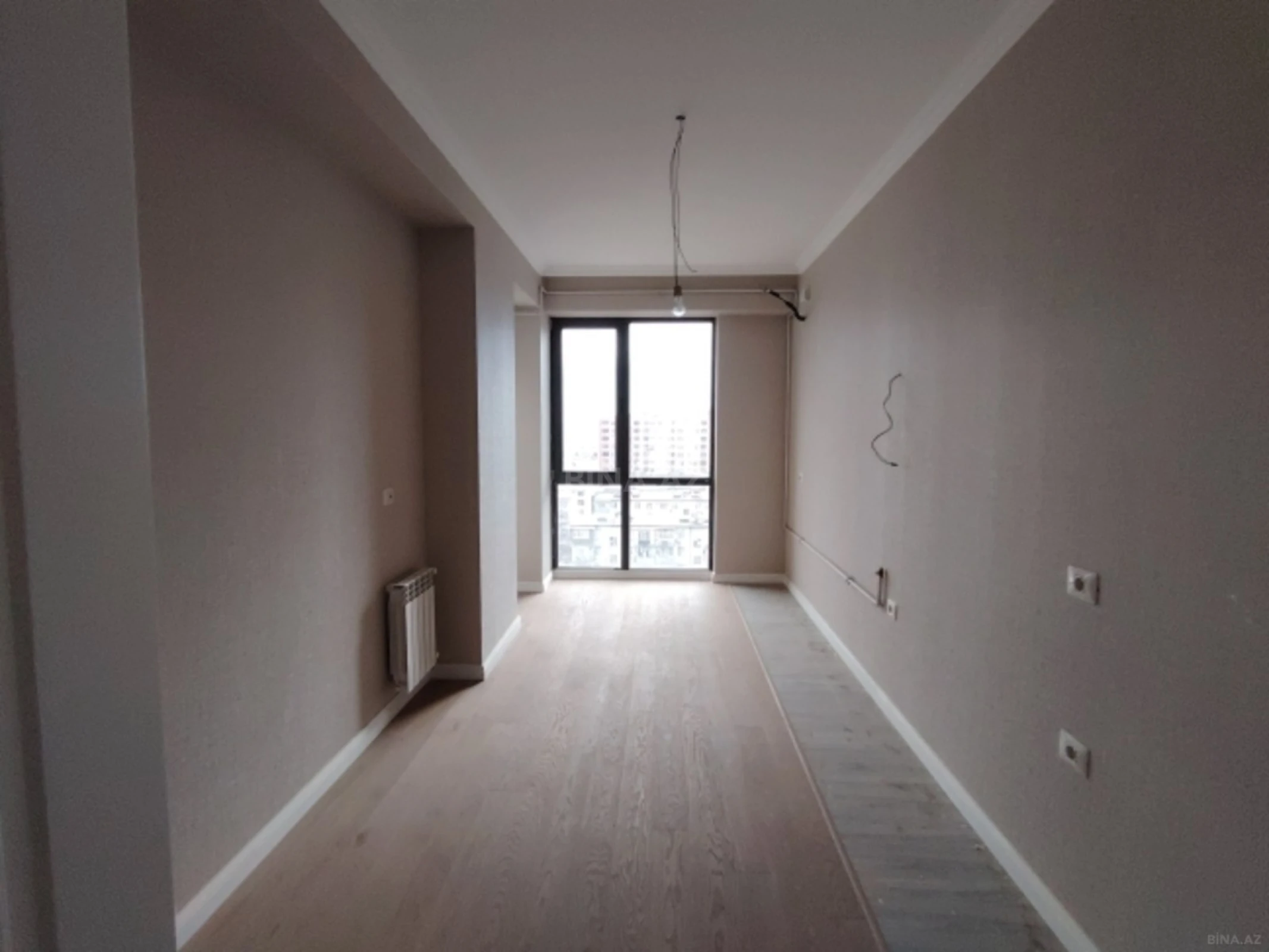 Satılır 4 otaqlı mənzil 121 m²