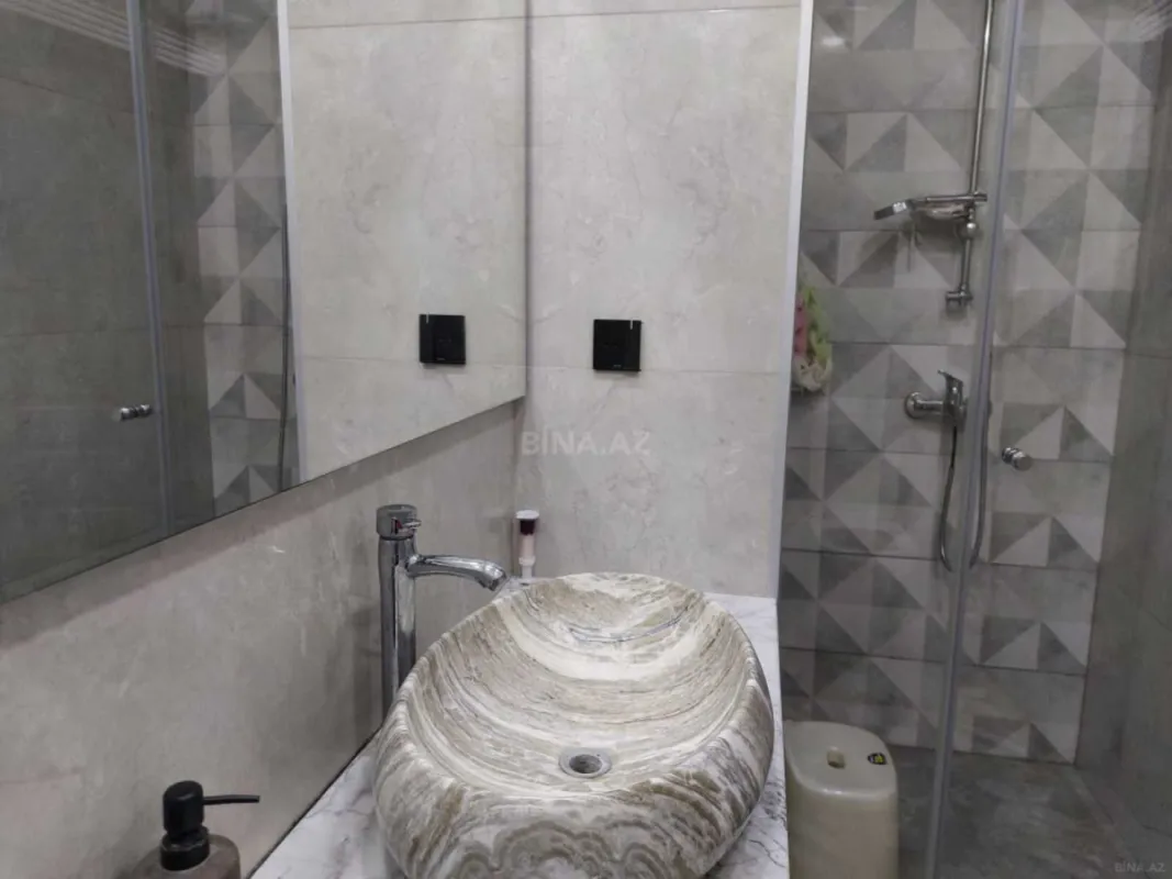 Satılır 4 otaqlı mənzil 105 m²