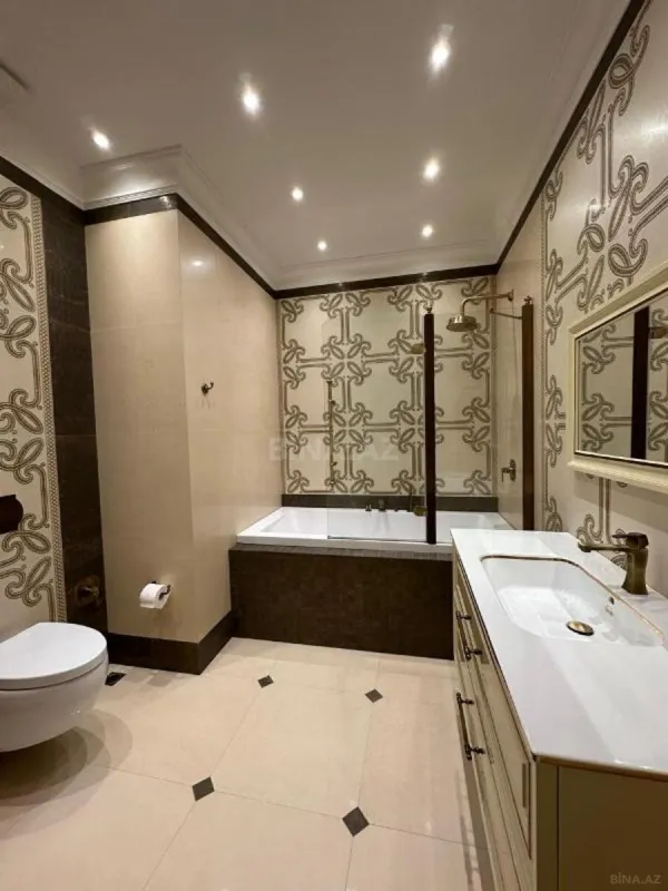 Satılır 4 otaqlı mənzil 205 m²