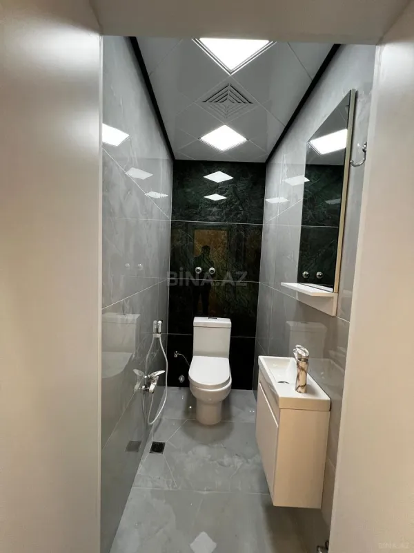 Satılır 4 otaqlı mənzil 133 m²