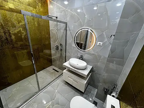 Satılır 4 otaqlı mənzil 133 m²