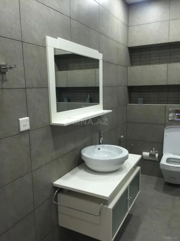 Satılır 4 otaqlı mənzil 210 m²