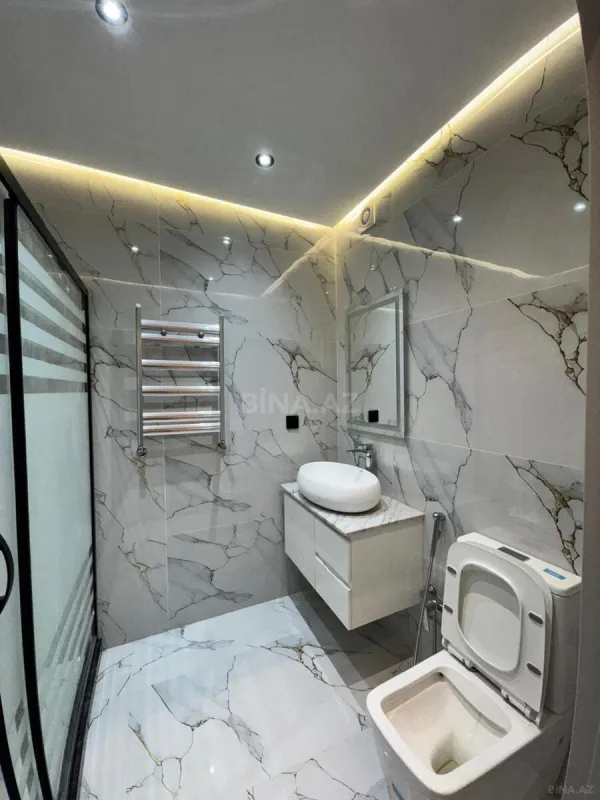 Satılır 4 otaqlı mənzil 132 m²