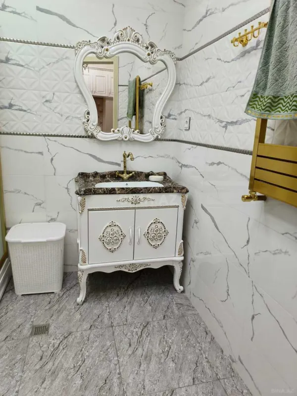 Satılır 4 otaqlı mənzil 147 m²