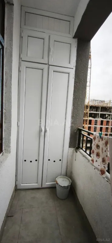 Satılır 4 otaqlı mənzil 129 m²