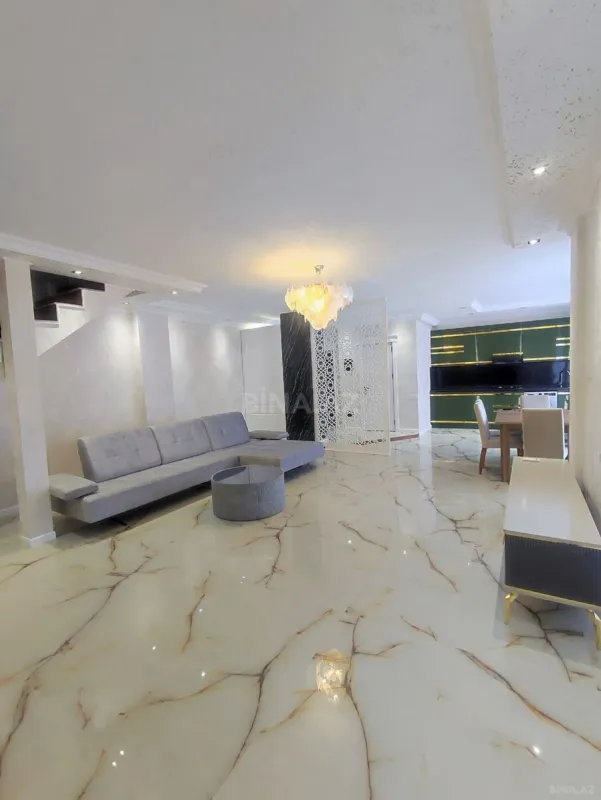 Satılır 4 otaqlı mənzil 122 m²