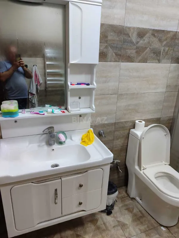 Satılır 4 otaqlı mənzil 147 m²