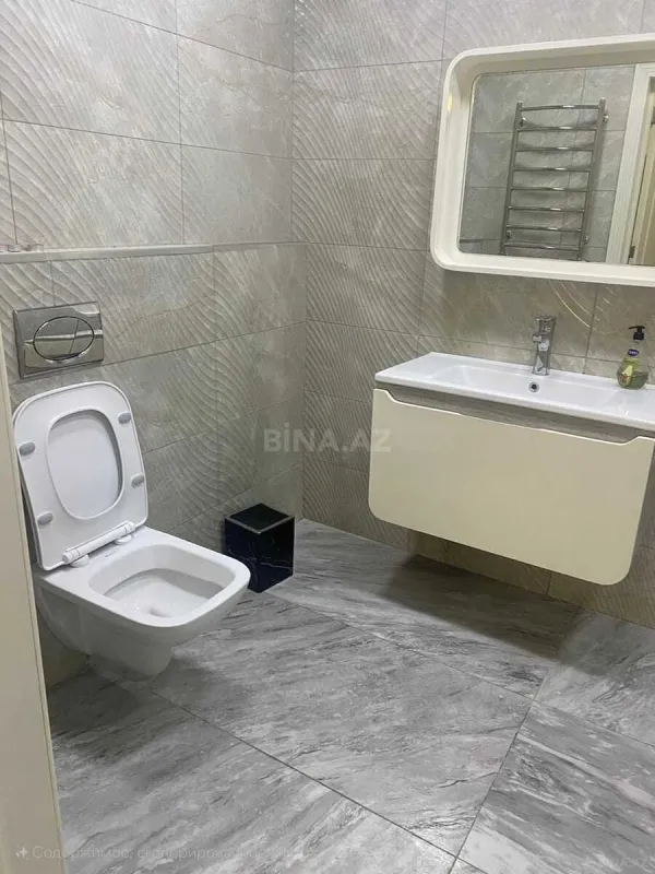 Satılır 2 otaqlı mənzil 103 m²