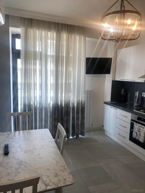 Satılır 2 otaqlı mənzil 103 m²