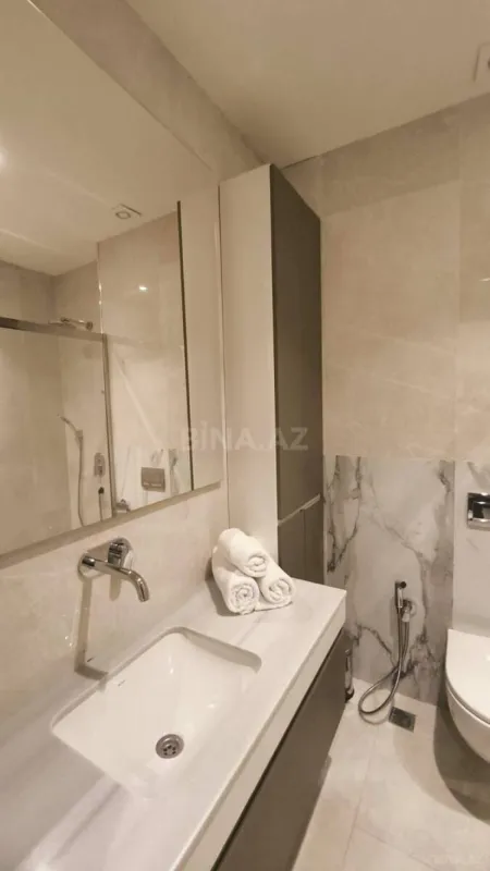 Satılır 2 otaqlı mənzil 103 m²