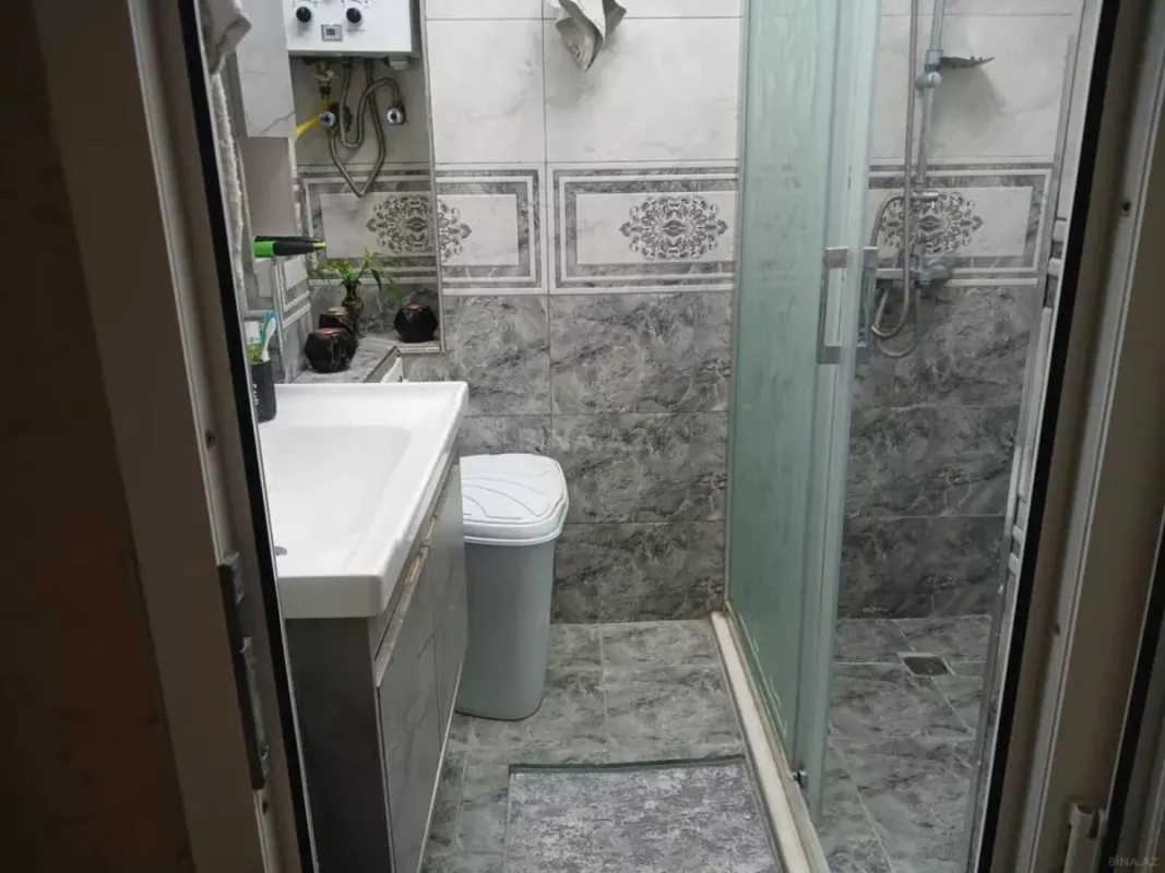 Satılır 4 otaqlı mənzil 115 m²