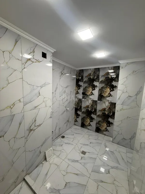 Satılır 4 otaqlı mənzil 103 m²