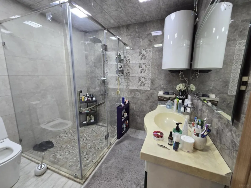 Satılır 4 otaqlı mənzil 161 m²