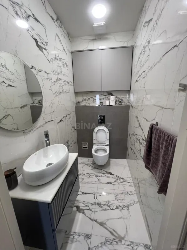 Satılır 3 otaqlı mənzil 141 m²