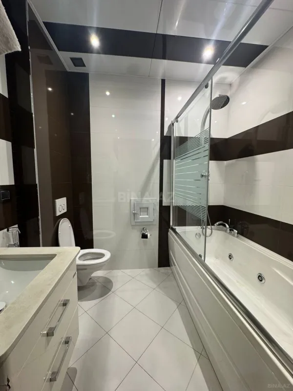 Satılır 4 otaqlı mənzil 147 m²