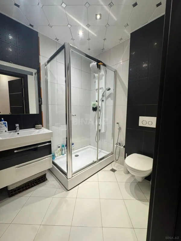 Satılır 4 otaqlı mənzil 147 m²