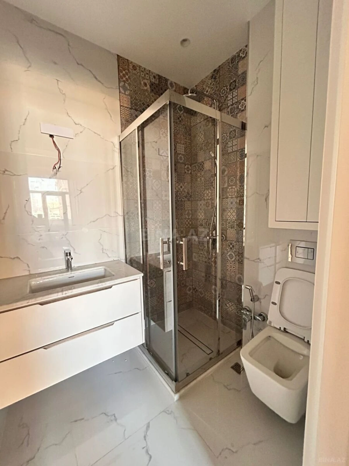 Satılır 3 otaqlı mənzil 148 m²