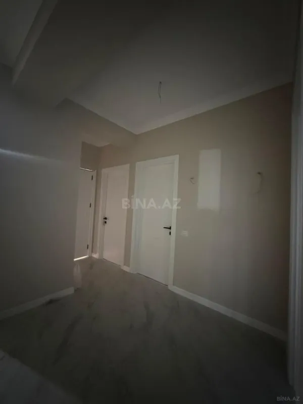 Satılır 4 otaqlı mənzil 125 m²