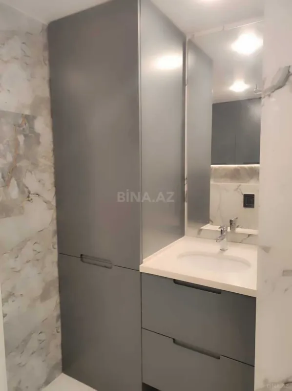 Satılır 4 otaqlı mənzil 135.5 m²