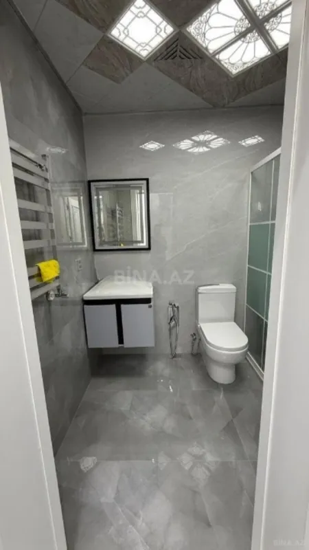 Satılır 4 otaqlı mənzil 131 m²