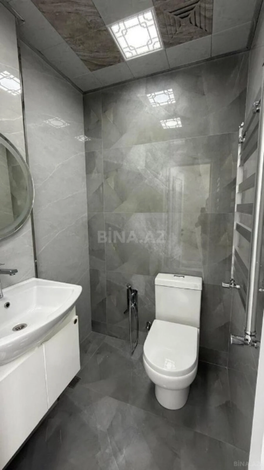Satılır 4 otaqlı mənzil 131 m²