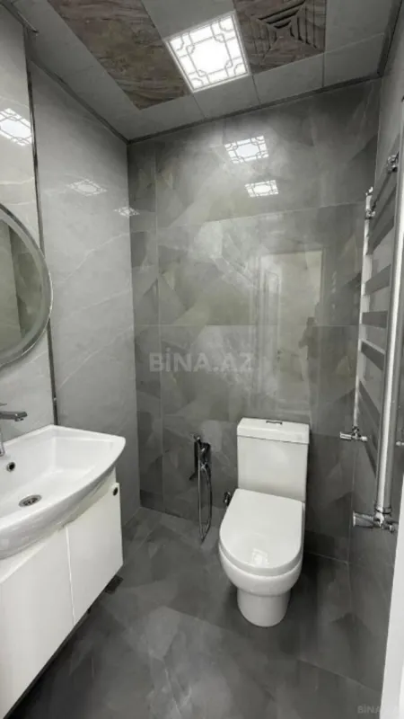 Satılır 4 otaqlı mənzil 131 m²