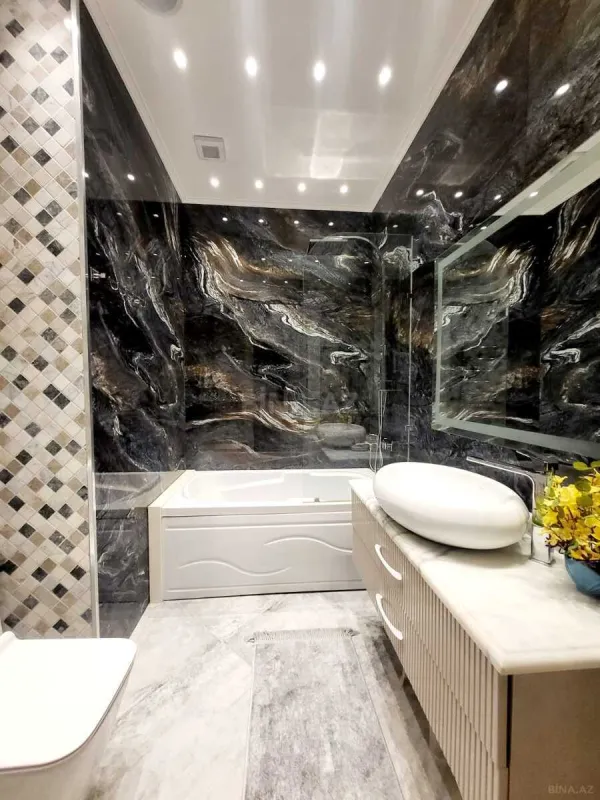 Satılır 4 otaqlı mənzil 179 m²