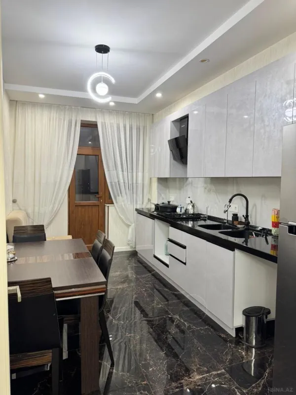 Satılır 4 otaqlı mənzil 128 m²
