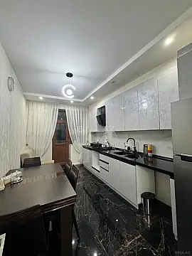 Satılır 4 otaqlı mənzil 128 m²