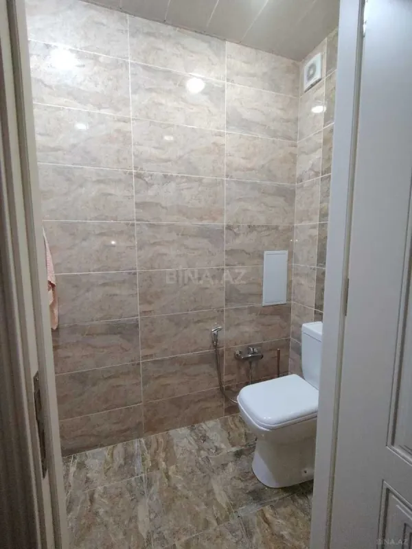 Satılır 4 otaqlı mənzil 133 m²