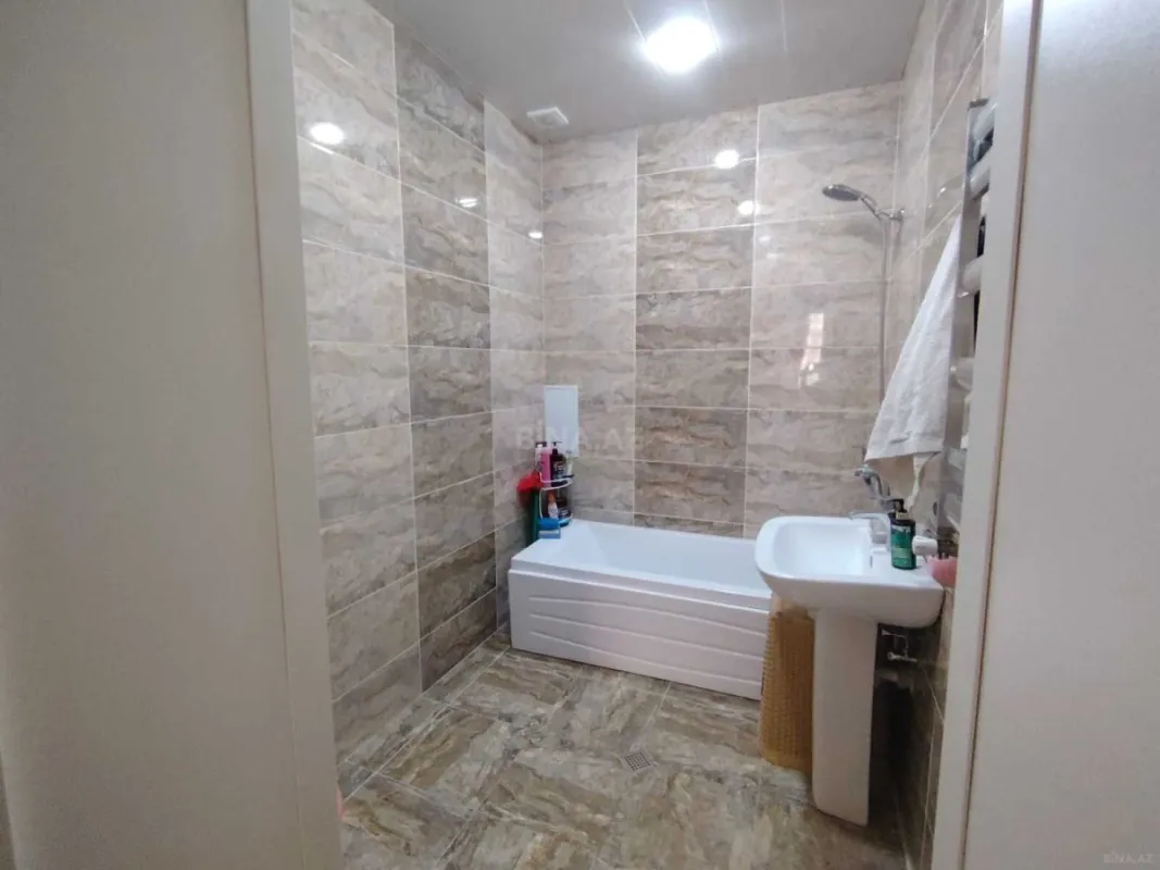 Satılır 4 otaqlı mənzil 133 m²