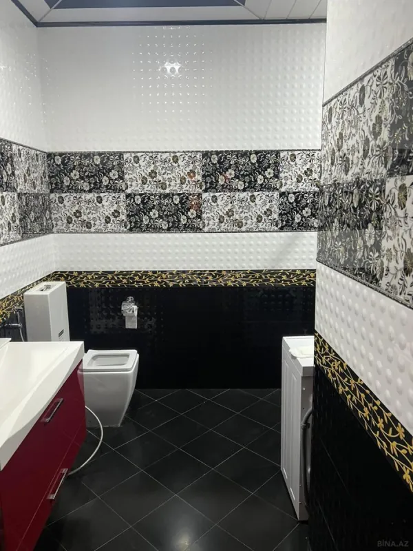 Satılır 4 otaqlı mənzil 210 m²