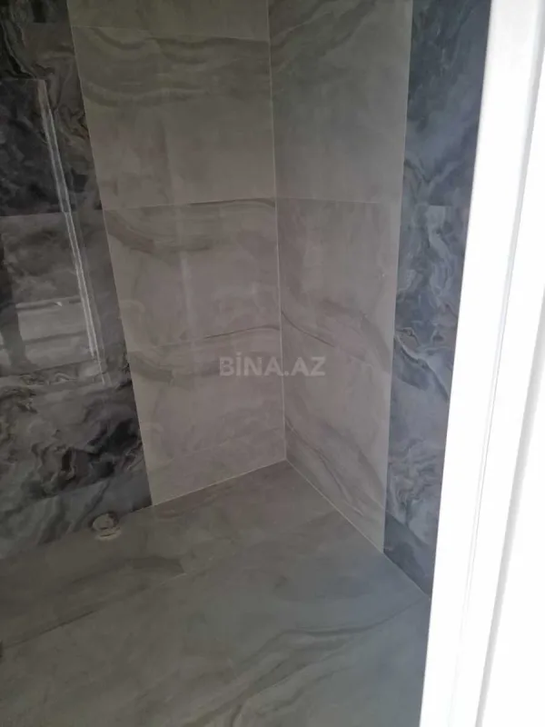 Satılır 4 otaqlı mənzil 205 m²