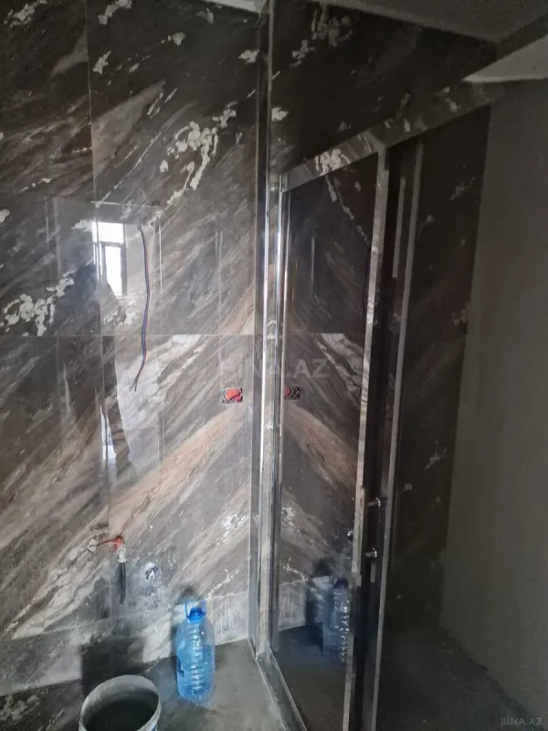 Satılır 4 otaqlı mənzil 205 m²