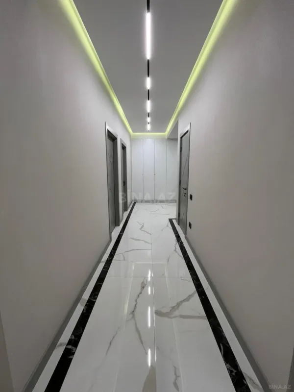 Satılır 4 otaqlı mənzil 145 m²