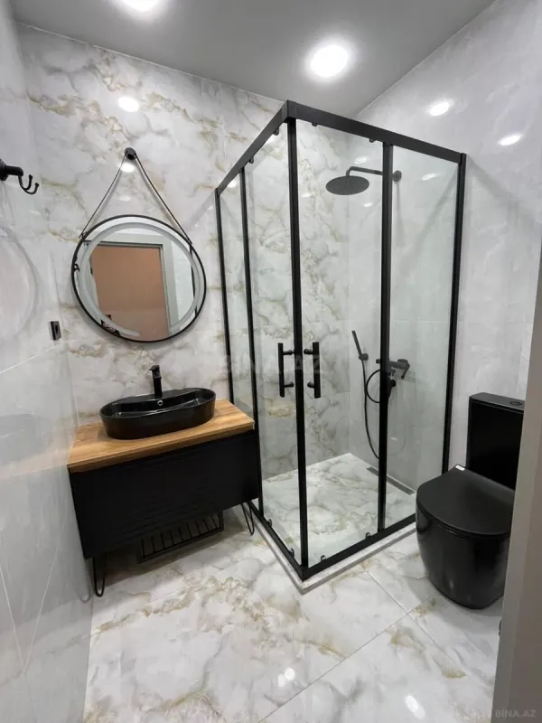 Satılır 4 otaqlı mənzil 145 m²