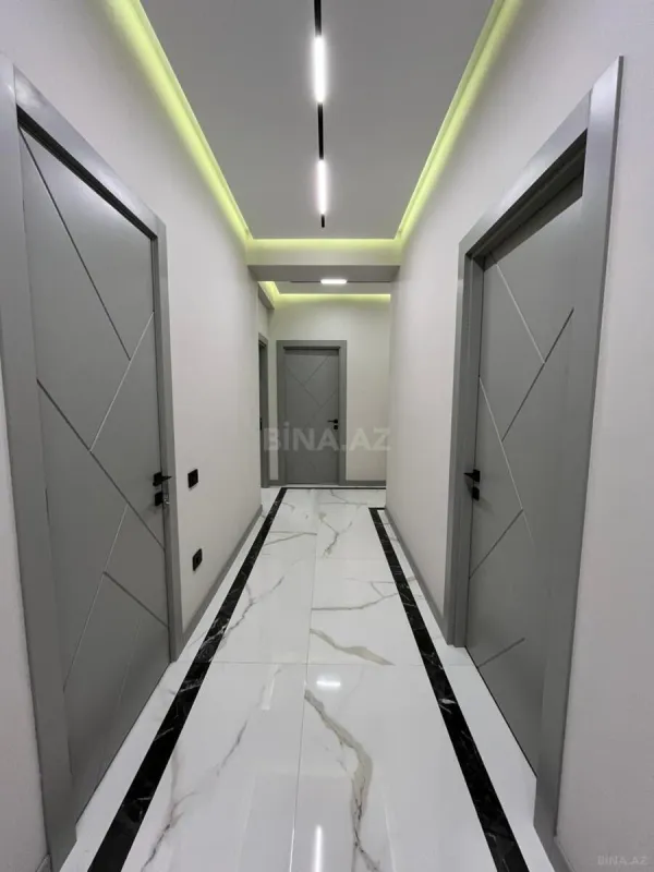 Satılır 4 otaqlı mənzil 145 m²