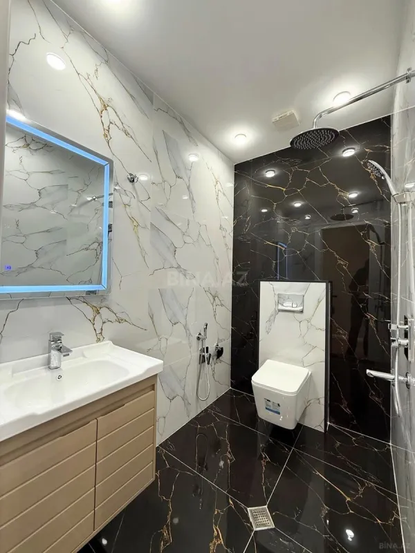 Satılır 4 otaqlı mənzil 138 m²