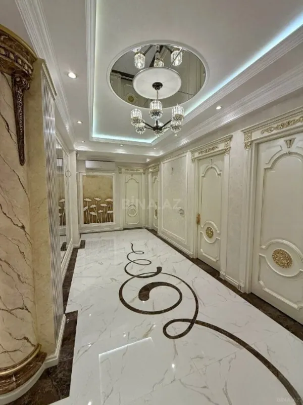 Satılır 4 otaqlı mənzil 165 m²