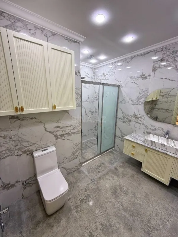 Satılır 4 otaqlı mənzil 165 m²