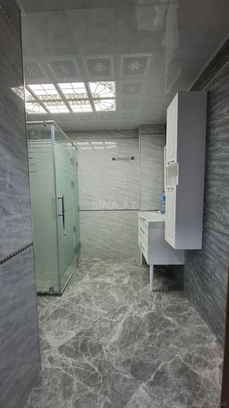 Satılır 4 otaqlı mənzil 146 m²