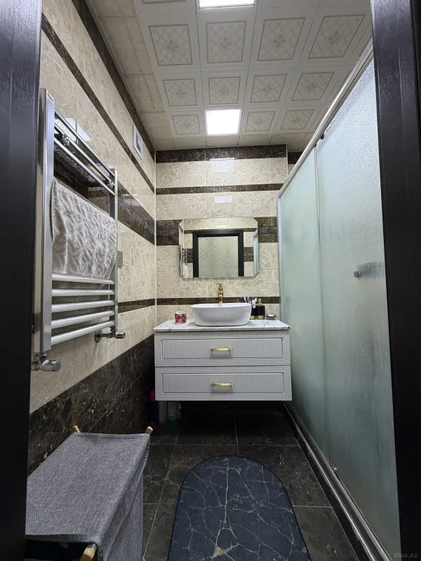 Satılır 4 otaqlı mənzil 135 m²