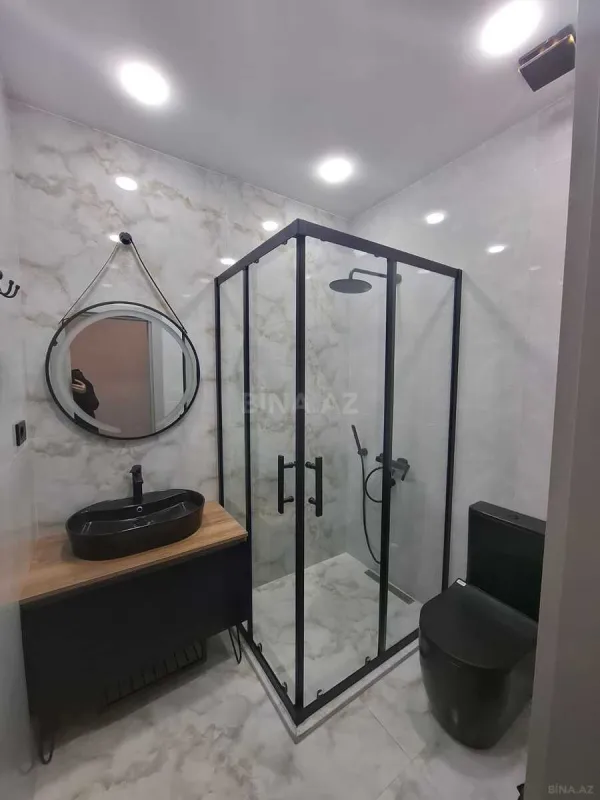 Satılır 4 otaqlı mənzil 145 m²