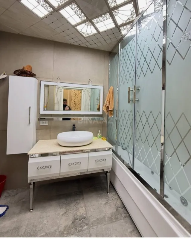 Satılır 4 otaqlı mənzil 210 m²