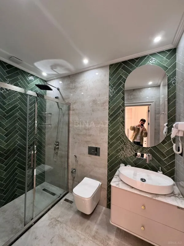 Satılır 4 otaqlı mənzil 165 m²