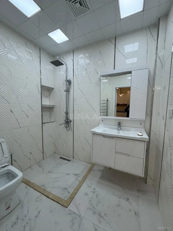 Satılır 2 otaqlı mənzil 64 m²